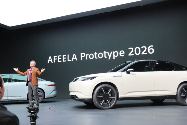 Man presenting at the Sony Honda Mobility Inc. Press Conference- CES 2026