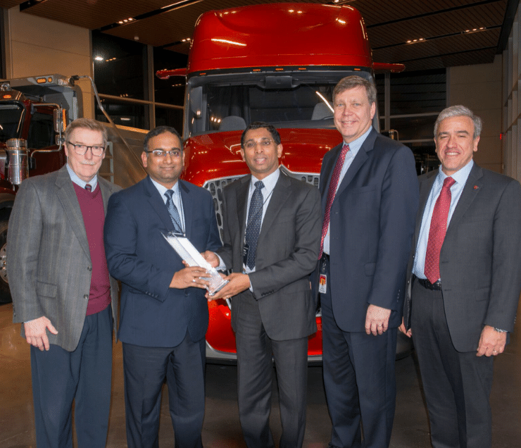Mathew Vachaparampil, CEO Caresoft Global and Richard Ambadipudi, CTO Caresoft Global with Troy A Clarke, Chairman Navistar International Corporation.