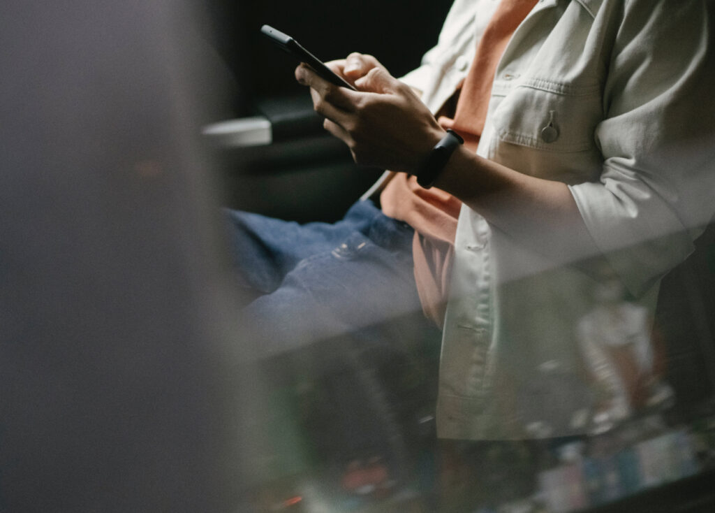 Commuter on phone - application development, software development